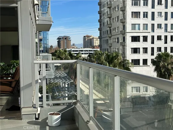 a view of a building from a balcony