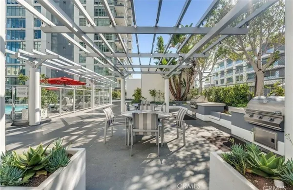 a view of a chairs and table in a patio