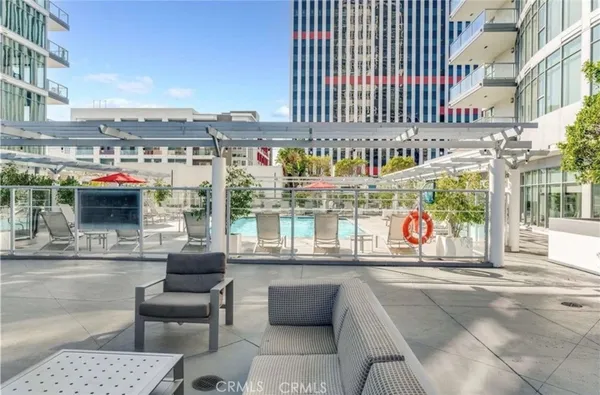 a view of a building with sitting area