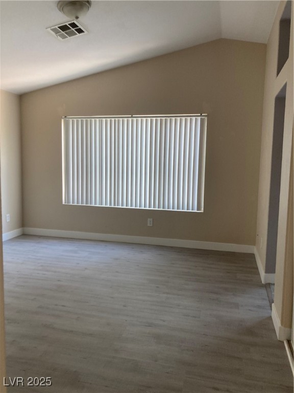 Undisclosed Address Las Vegas, NV 89128 - Photo 15 of 21 Unfurnished room featuring wood finished floors, l