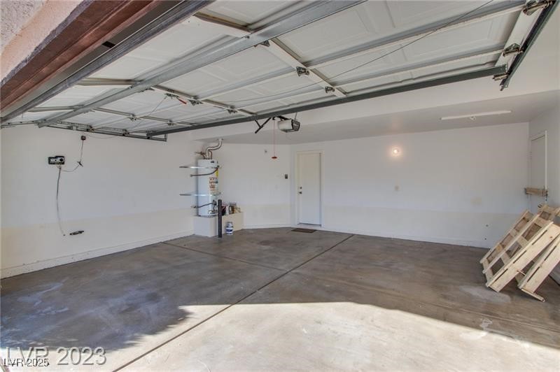 Undisclosed Address Las Vegas, NV 89128 - Photo 4 of 21 Garage with a garage door opener
