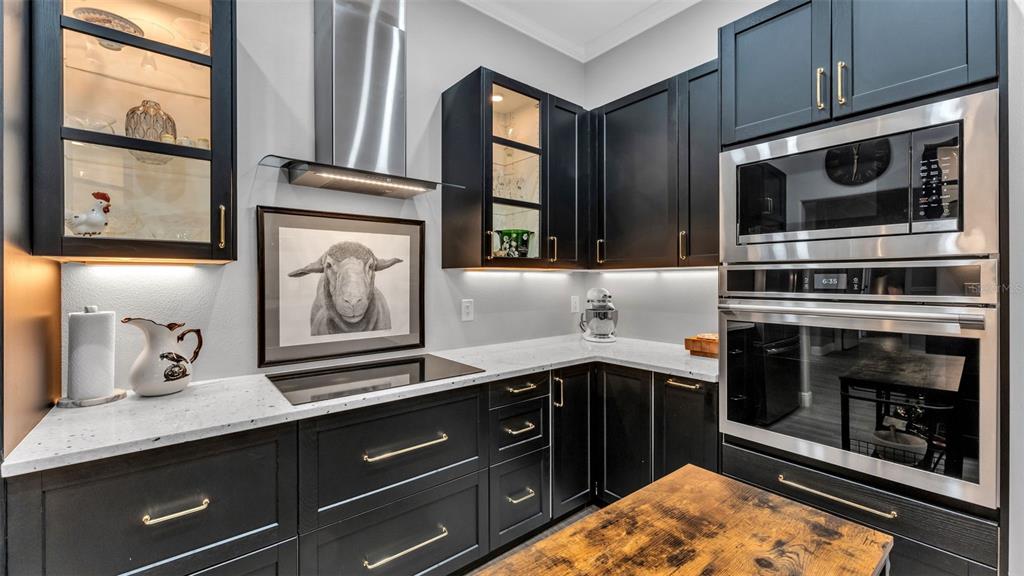 422 Mc Cormick Road Apopka, FL 32703 - Photo 16 of 95 a kitchen with stainless steel appliances a stove and a microwave