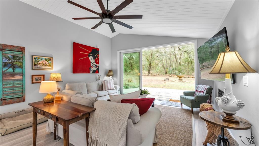 422 Mc Cormick Road Apopka, FL 32703 - Photo 31 of 95 a living room with furniture and a window