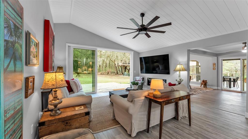 422 Mc Cormick Road Apopka, FL 32703 - Photo 32 of 95 a living room with furniture and a flat screen tv