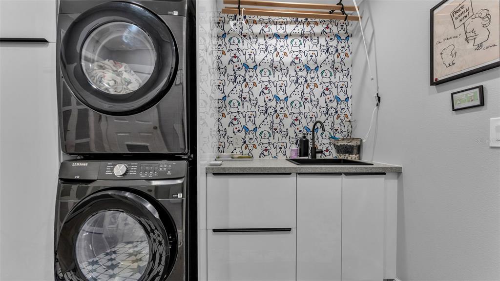 422 Mc Cormick Road Apopka, FL 32703 - Photo 37 of 95 a view of a washer and dryer