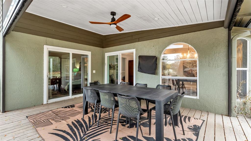 422 Mc Cormick Road Apopka, FL 32703 - Photo 47 of 95 a view of a dining room with furniture window and outside view