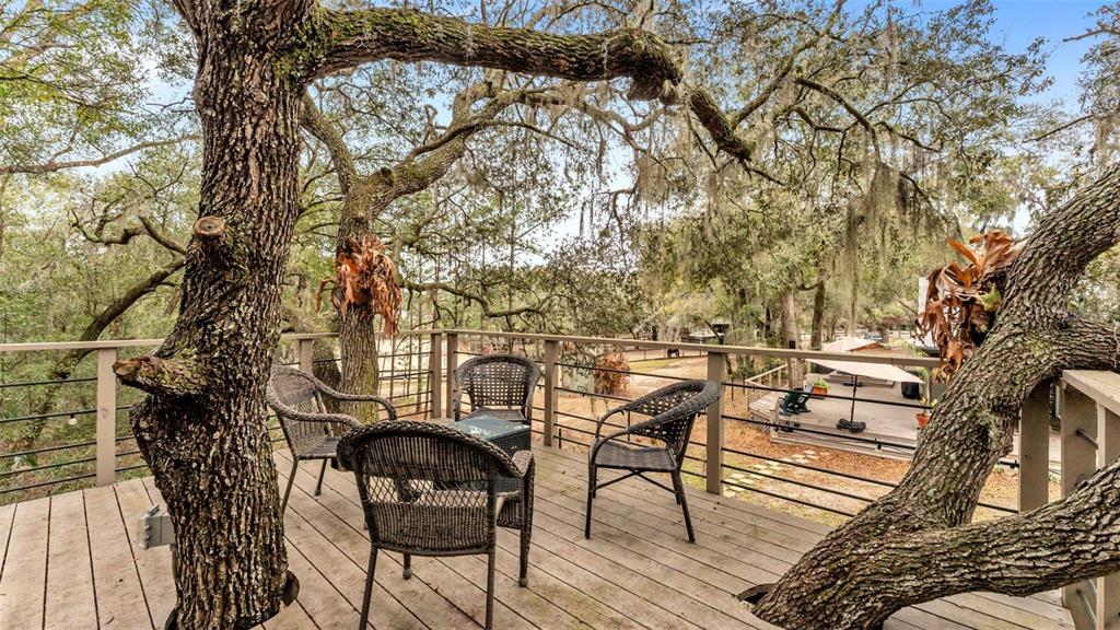 422 Mc Cormick Road Apopka, FL 32703 - Photo 50 of 95 a view of a chairs and table in the patio