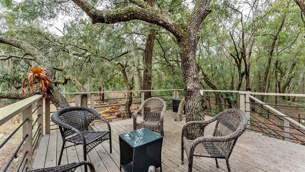 422 Mc Cormick Road Apopka, FL 32703 - Photo 51 of 95 a balcony with table and chairs