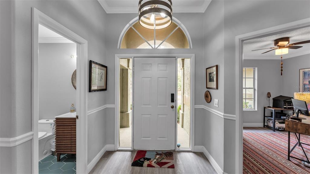 422 Mc Cormick Road Apopka, FL 32703 - Photo 9 of 95 a view of living room with furniture and a window
