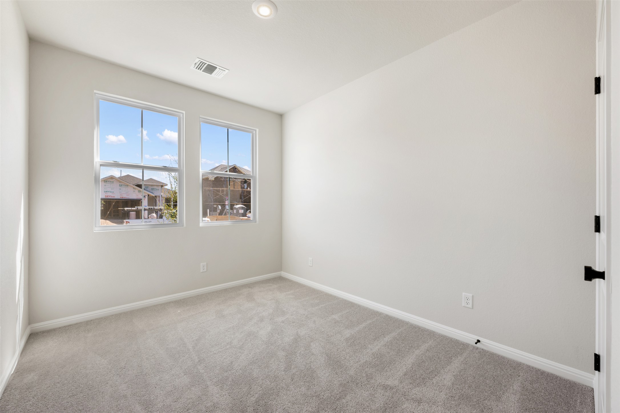 1036 Sienna Bear Road Georgetown, TX 78633 - Photo 2 of 33 an empty room with windows