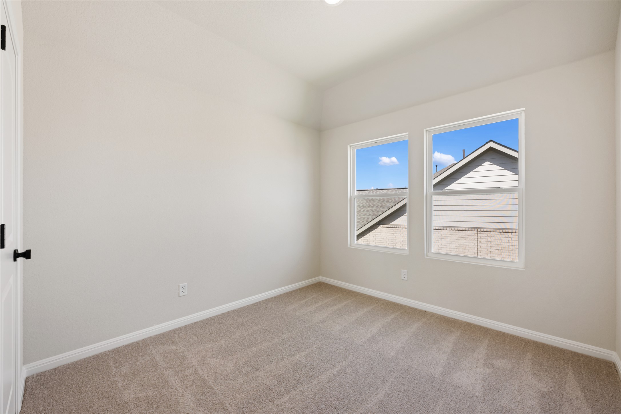 1036 Sienna Bear Road Georgetown, TX 78633 - Photo 22 of 33 an empty room with windows and closet