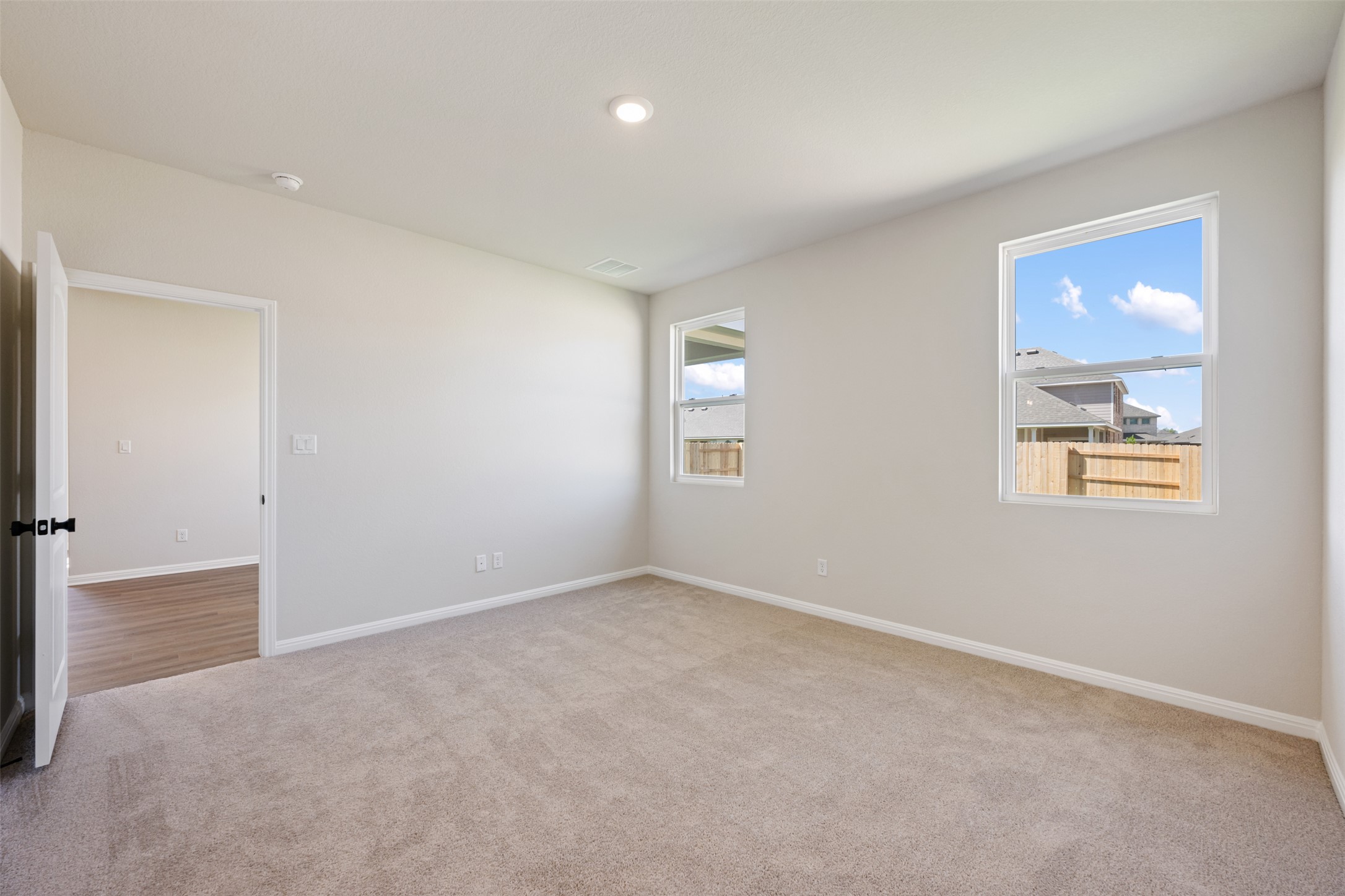 1036 Sienna Bear Road Georgetown, TX 78633 - Photo 33 of 33 an empty room with windows