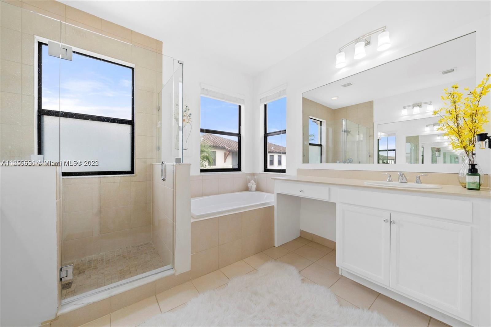 Hialeah Hialeah, FL 33018 - Photo 18 of 54 a bathroom with a double vanity sink mirror and bathtub