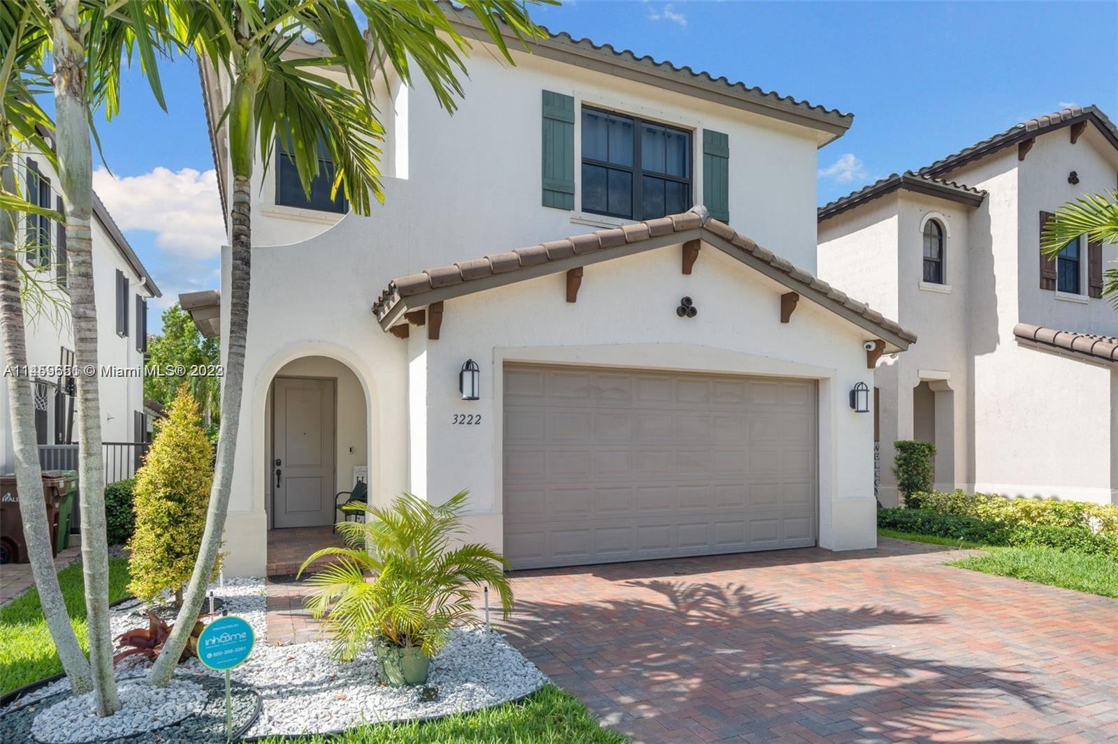 Hialeah Hialeah, FL 33018 - Photo 3 of 54 a front view of a house with garden