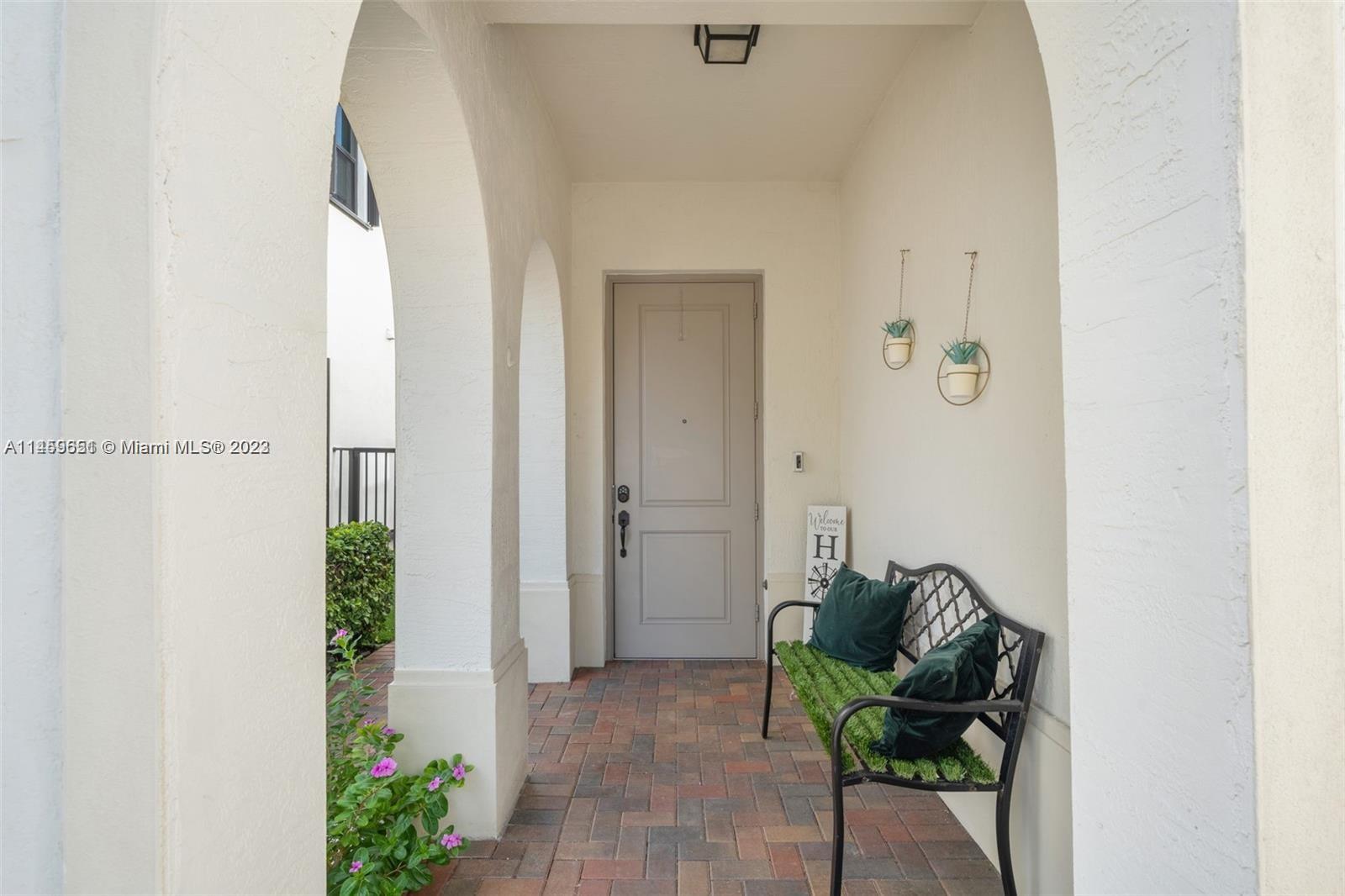 Hialeah Hialeah, FL 33018 - Photo 4 of 54 a living room with furniture and a potted plant