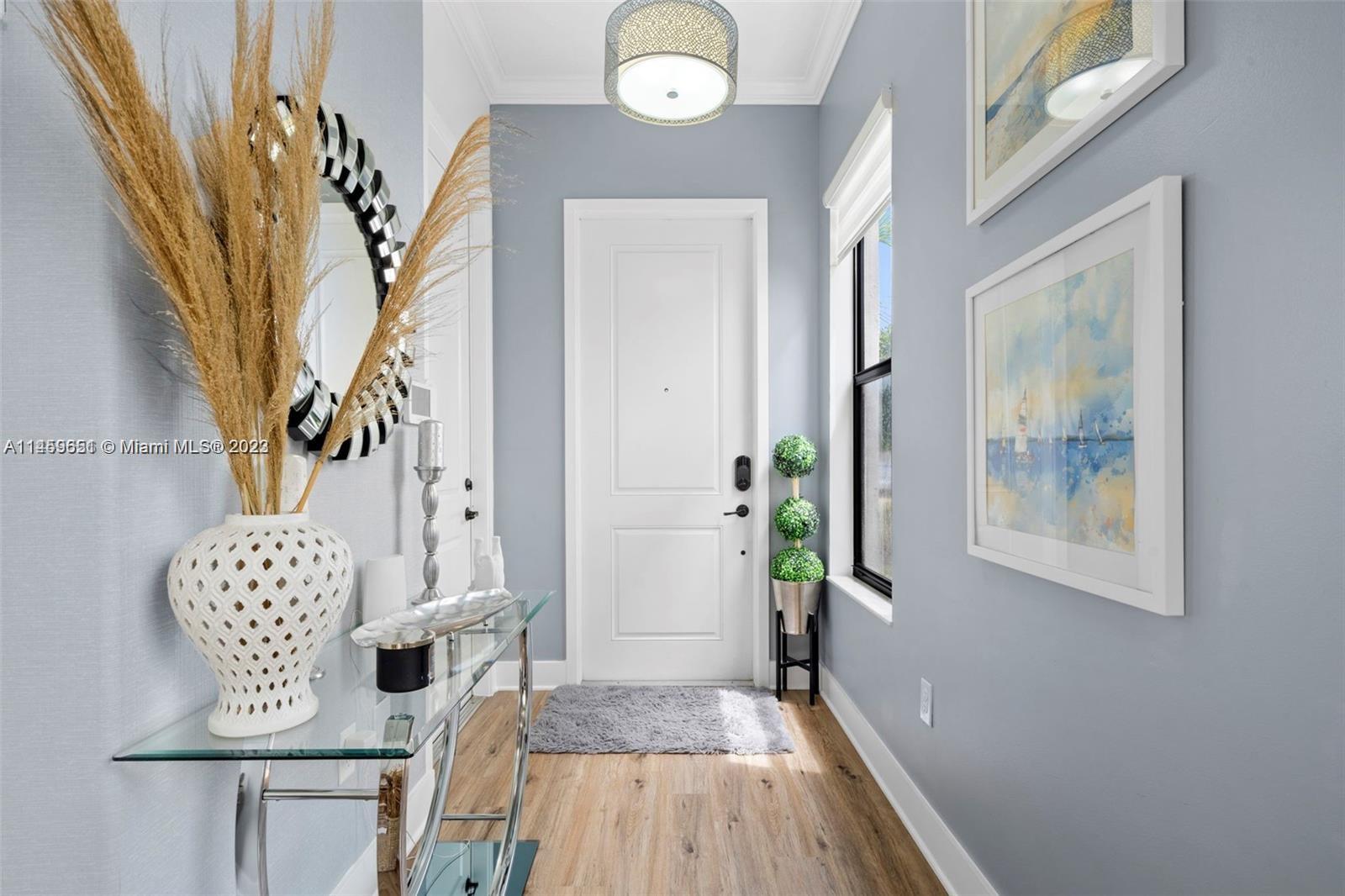 Hialeah Hialeah, FL 33018 - Photo 5 of 54 a view of entryway with wooden floor