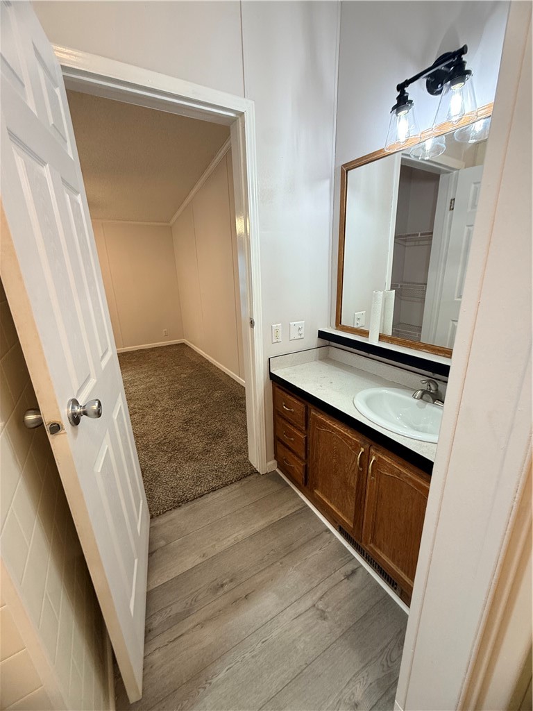 307 West 7th Street St. Elmo, IL 62458 - Photo 12 of 17 a bathroom with a sink and a mirror