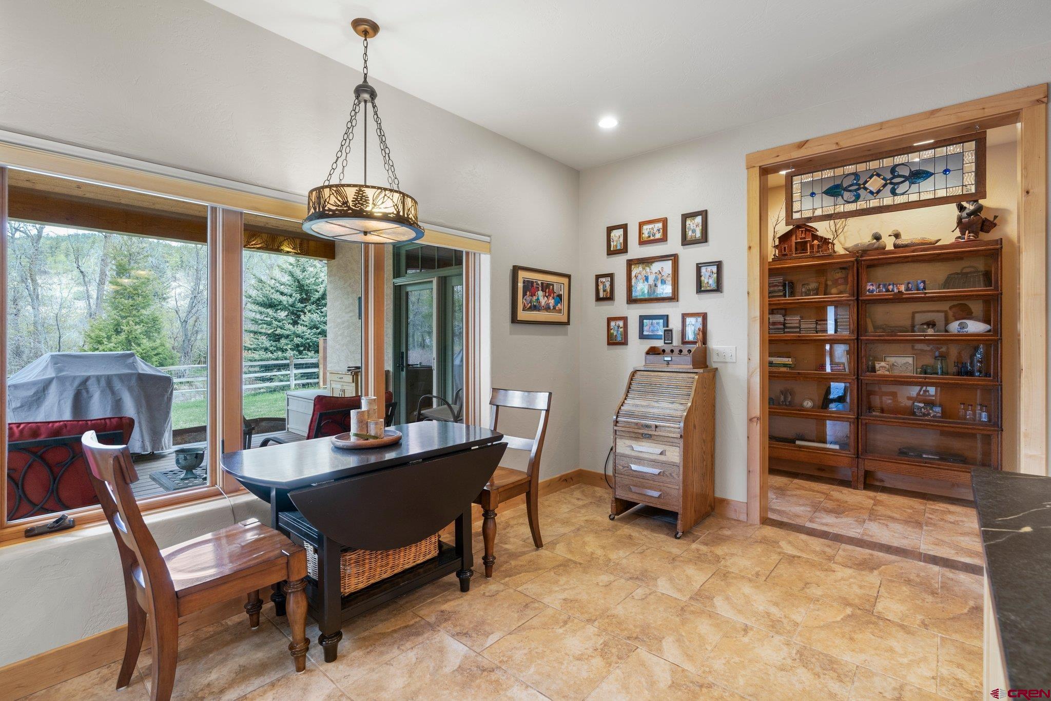 99 River Road Durango, CO 81301 - Photo 14 of 44 a living room with furniture and a flat screen tv
