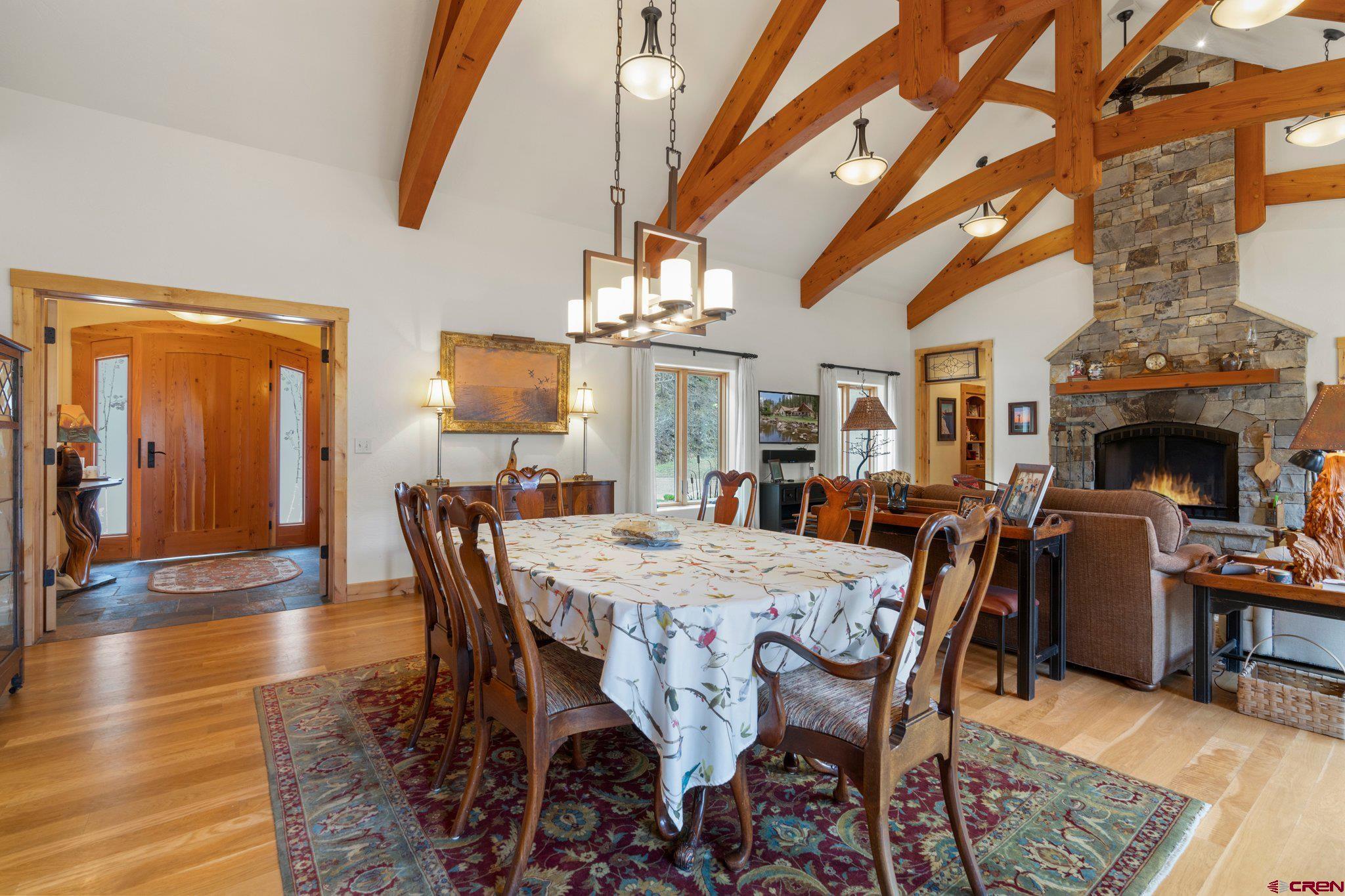 99 River Road Durango, CO 81301 - Photo 15 of 44 a view of a dining room with furniture window and wooden floor