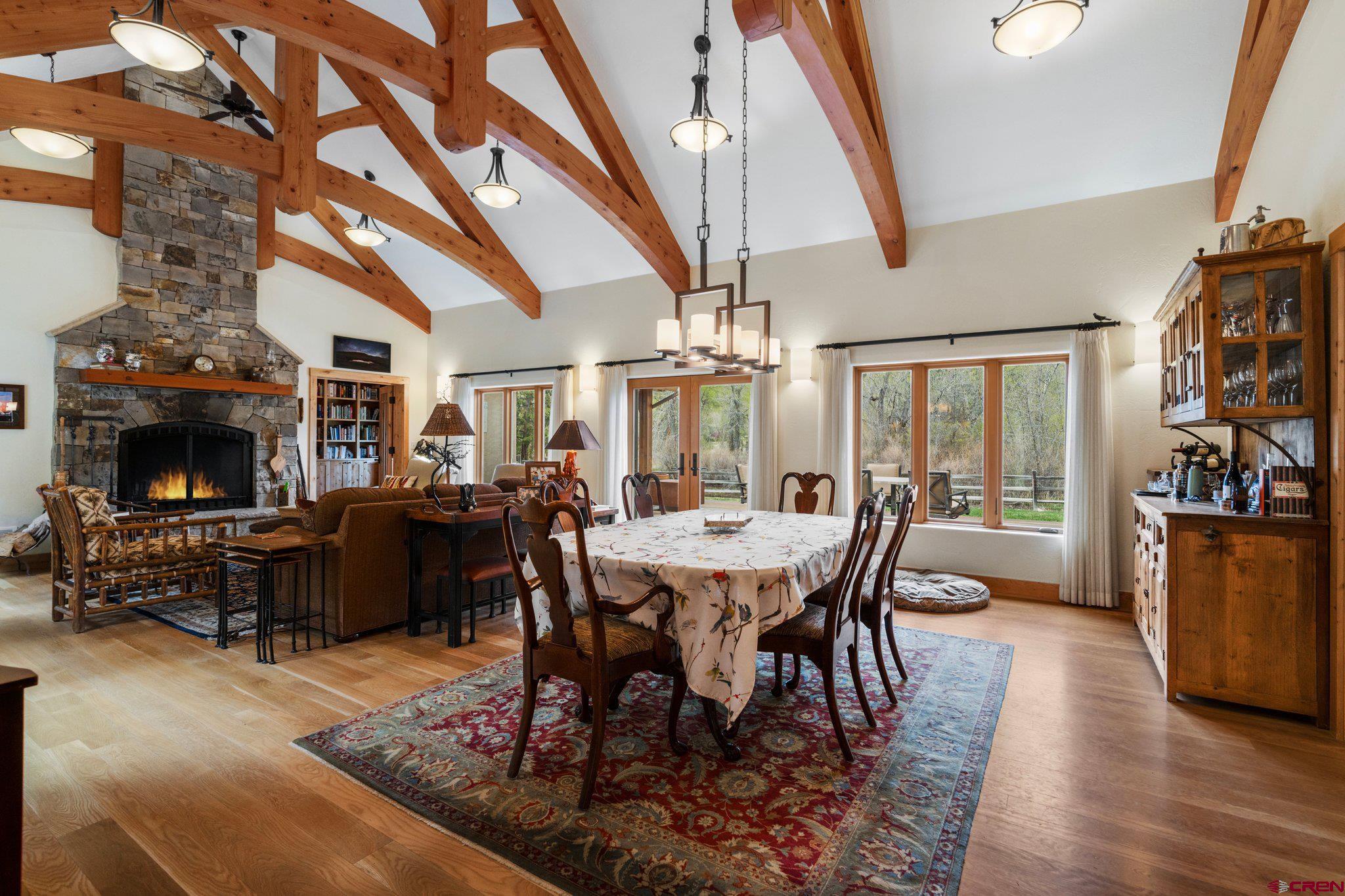 99 River Road Durango, CO 81301 - Photo 16 of 44 a view of a dining room with furniture window and wooden floor