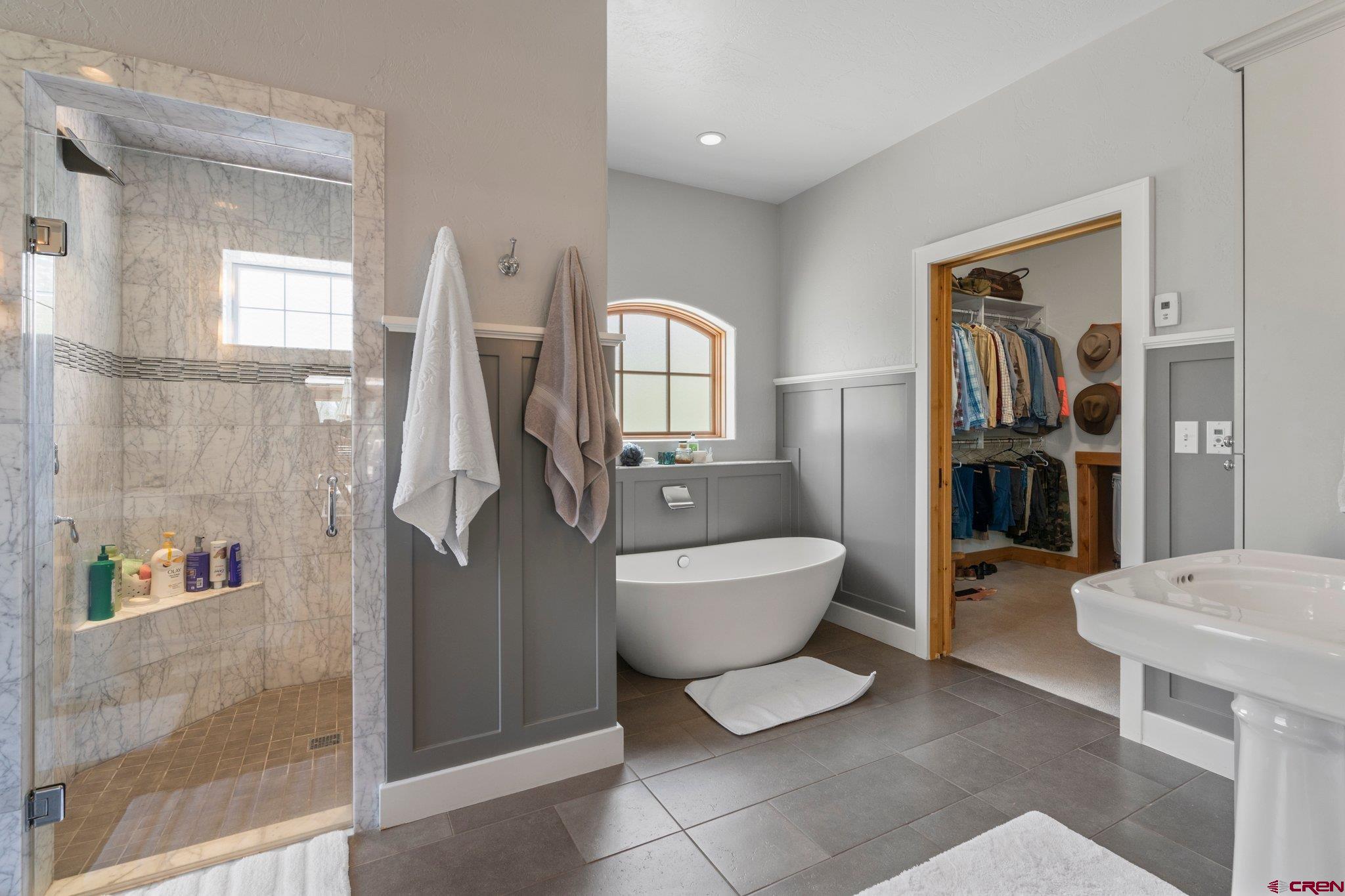 99 River Road Durango, CO 81301 - Photo 19 of 44 a spacious bathroom with a toilet sink and shower