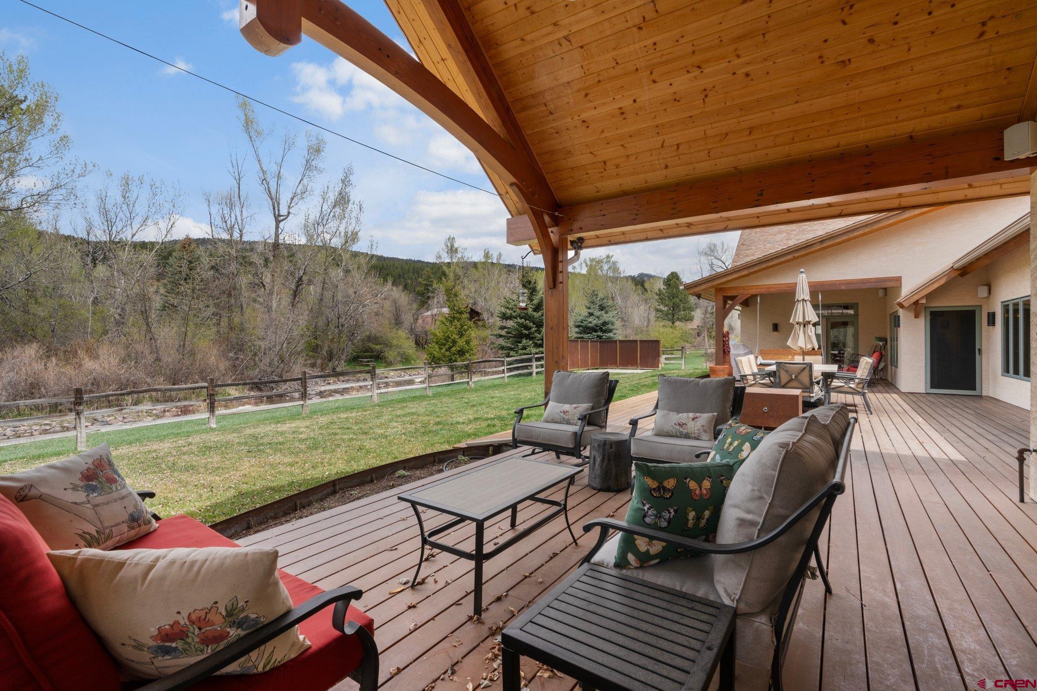 99 River Road Durango, CO 81301 - Photo 30 of 44 a view of a patio with couches chairs and a table