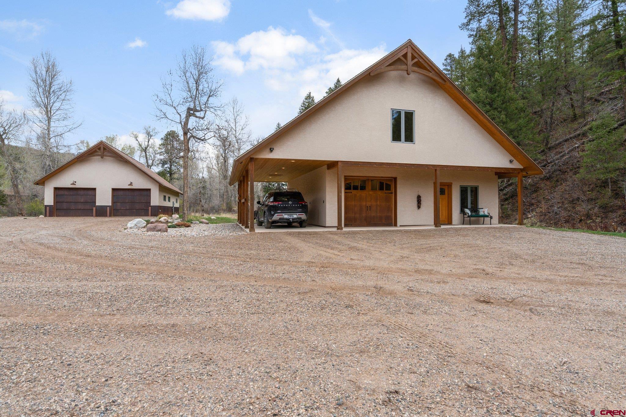 99 River Road Durango, CO 81301 - Photo 31 of 44 a view of house with yard and entertaining space