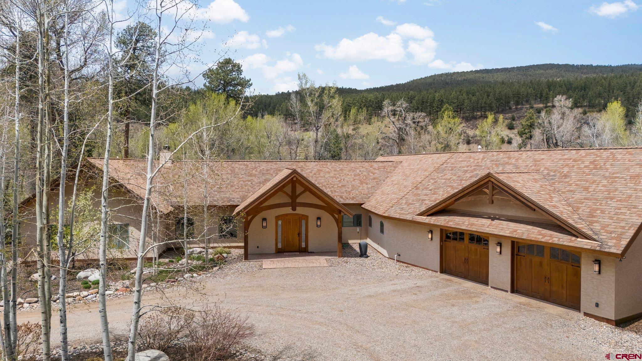 99 River Road Durango, CO 81301 - Photo 39 of 44 a view of a house with a yard