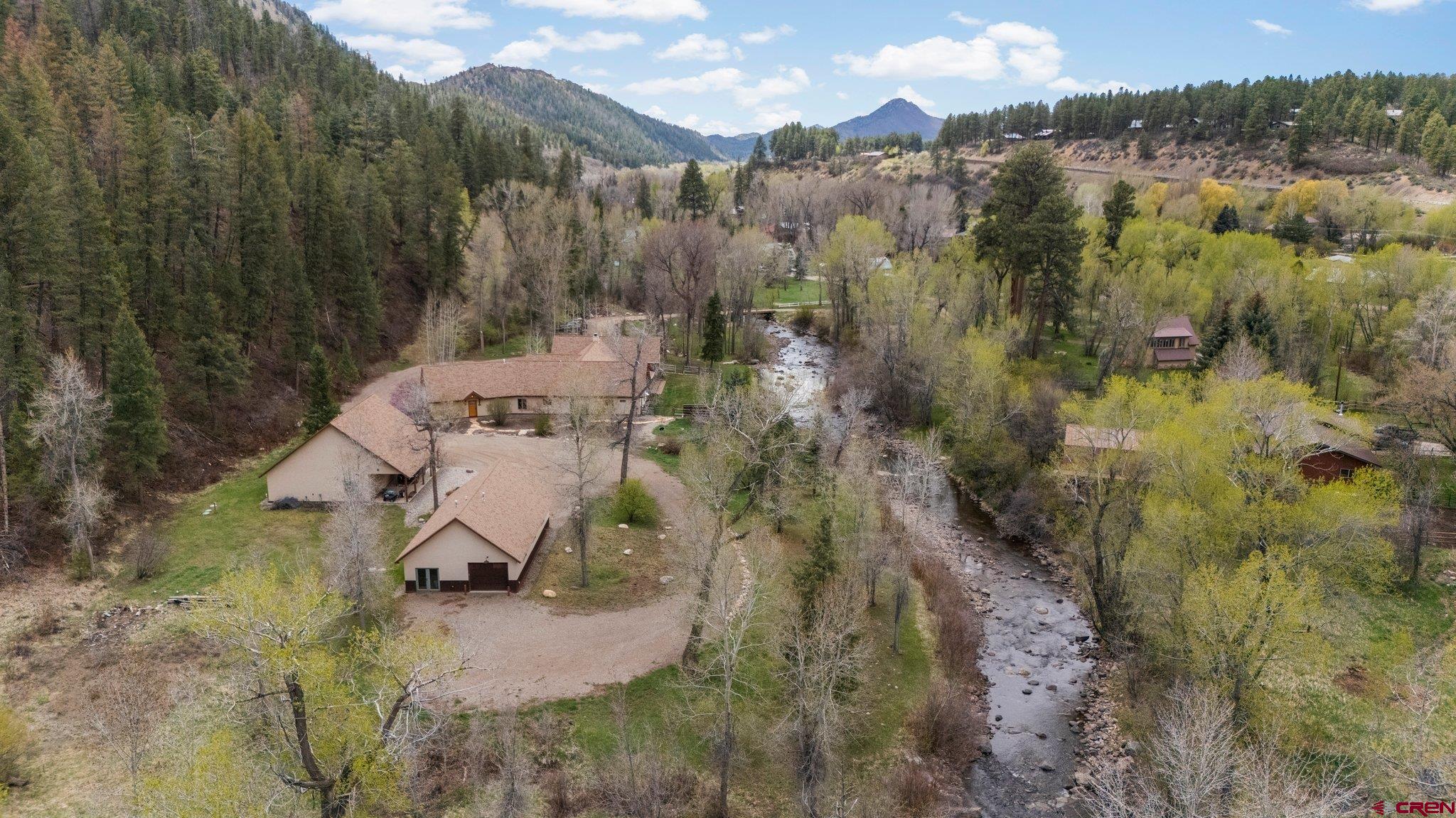 99 River Road Durango, CO 81301 - Photo 43 of 44 a view of a house with a yard