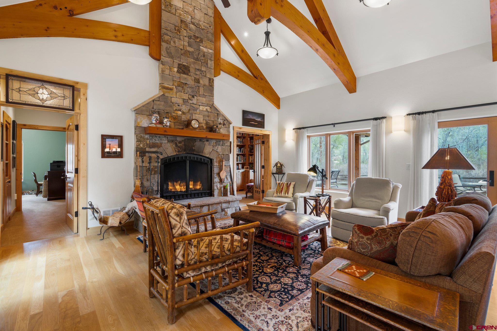 99 River Road Durango, CO 81301 - Photo 6 of 44 a living room with furniture and a fireplace