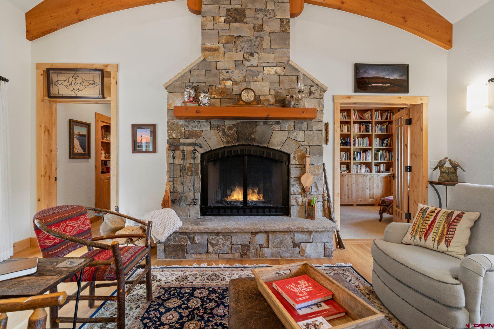 99 River Road Durango, CO 81301 - Photo 7 of 44 a living room with furniture and a fireplace