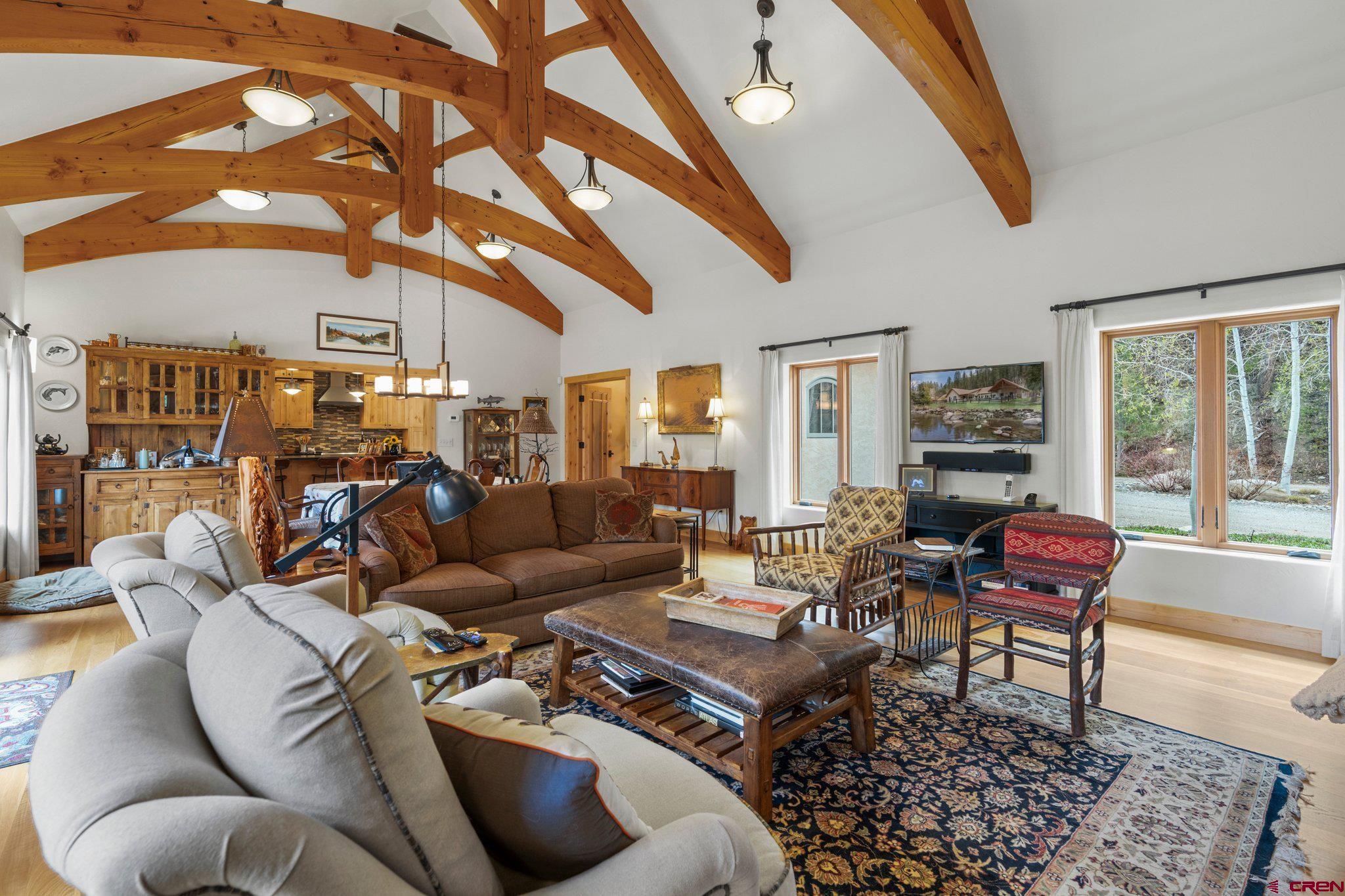 99 River Road Durango, CO 81301 - Photo 9 of 44 a living room with furniture and a large window