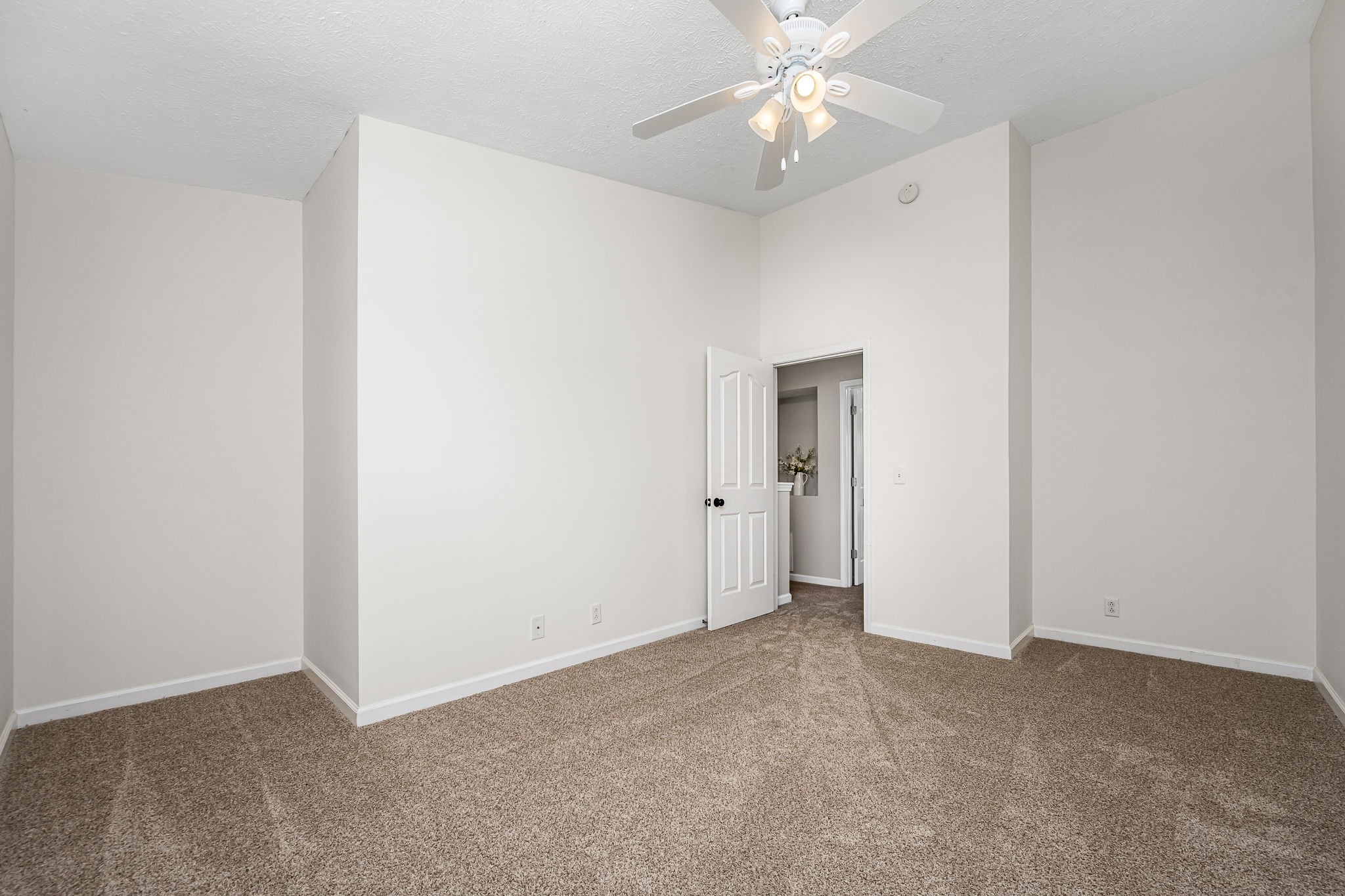 3216 Terrapin Court Murfreesboro, TN 37128 - Photo 12 of 17 an empty room with a ceiling fan and a window