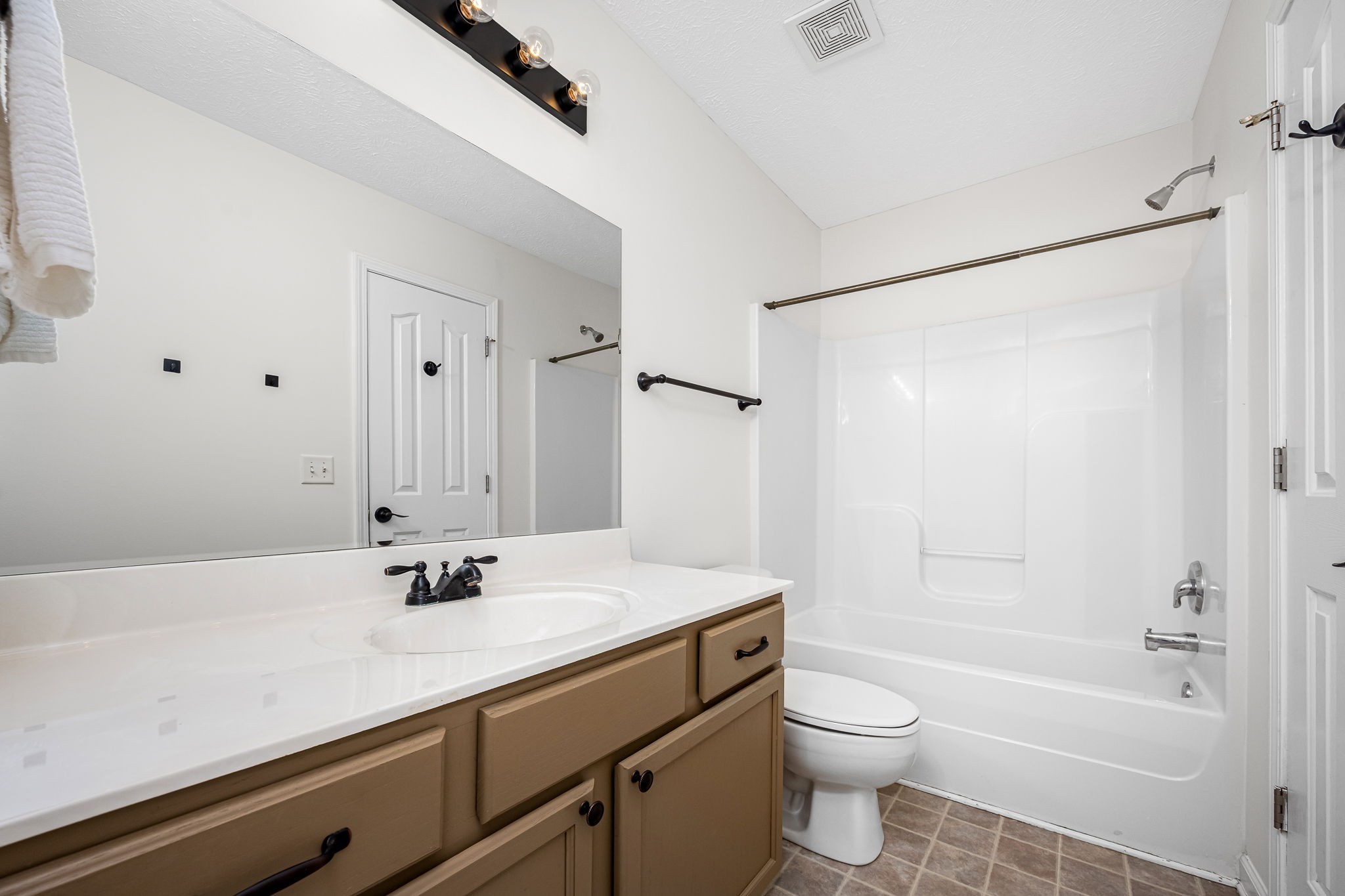 3216 Terrapin Court Murfreesboro, TN 37128 - Photo 13 of 17 a bathroom with a sink a toilet and shower