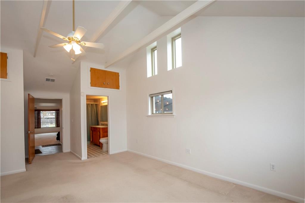 235 Highview Avenue Pittsburgh, PA 15238 - Photo 25 of 39 a view of a livingroom with a ceiling fan and window