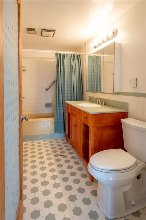 235 Highview Avenue Pittsburgh, PA 15238 - Photo 26 of 39 a bathroom with a sink a toilet a mirror and shower