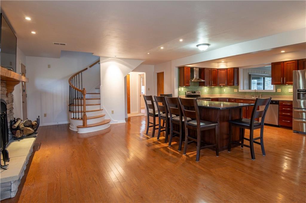 235 Highview Avenue Pittsburgh, PA 15238 - Photo 9 of 39 a view of a dining room with furniture window and wooden floor