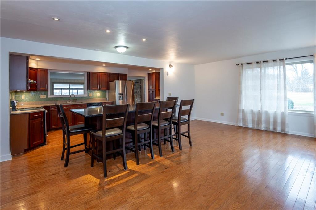 235 Highview Avenue Pittsburgh, PA 15238 - Photo 10 of 39 a view of a dining room with furniture window and wooden floor