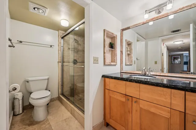 a close view of a utility room with washer and dryer