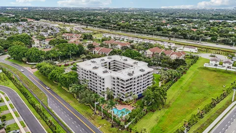 an aerial view of multiple house with outdoor space