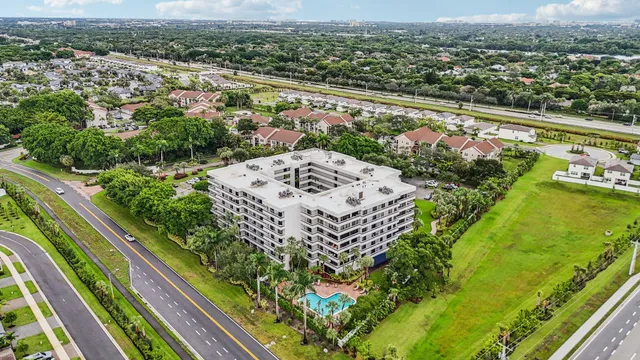 an aerial view of multiple house with outdoor space