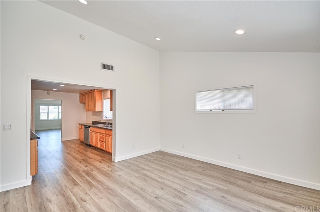18319 Norwalk Boulevard Artesia, CA 90701 - Photo 18 of 39 a view of empty room with wooden floor