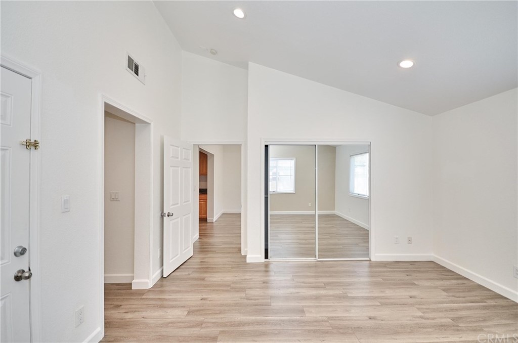 18319 Norwalk Boulevard Artesia, CA 90701 - Photo 22 of 39 a view of empty room with wooden floor