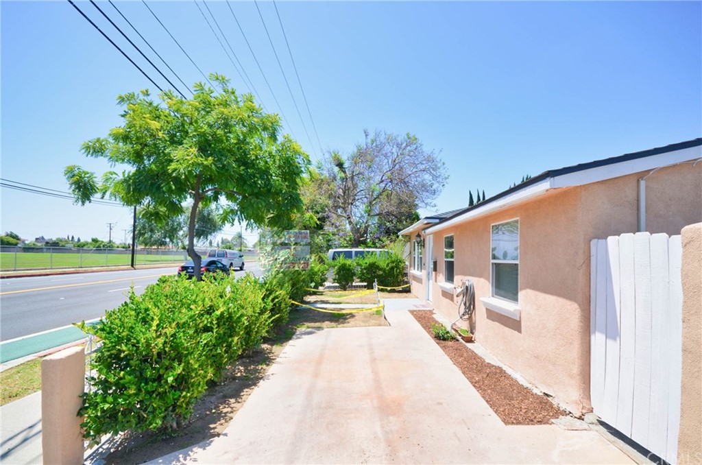 18319 Norwalk Boulevard Artesia, CA 90701 - Photo 27 of 39 a view of a backyard with potted plants