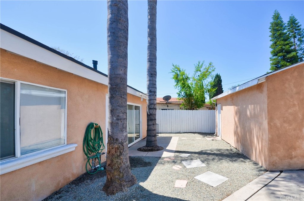 18319 Norwalk Boulevard Artesia, CA 90701 - Photo 32 of 39 a view of a chair and table in the patio