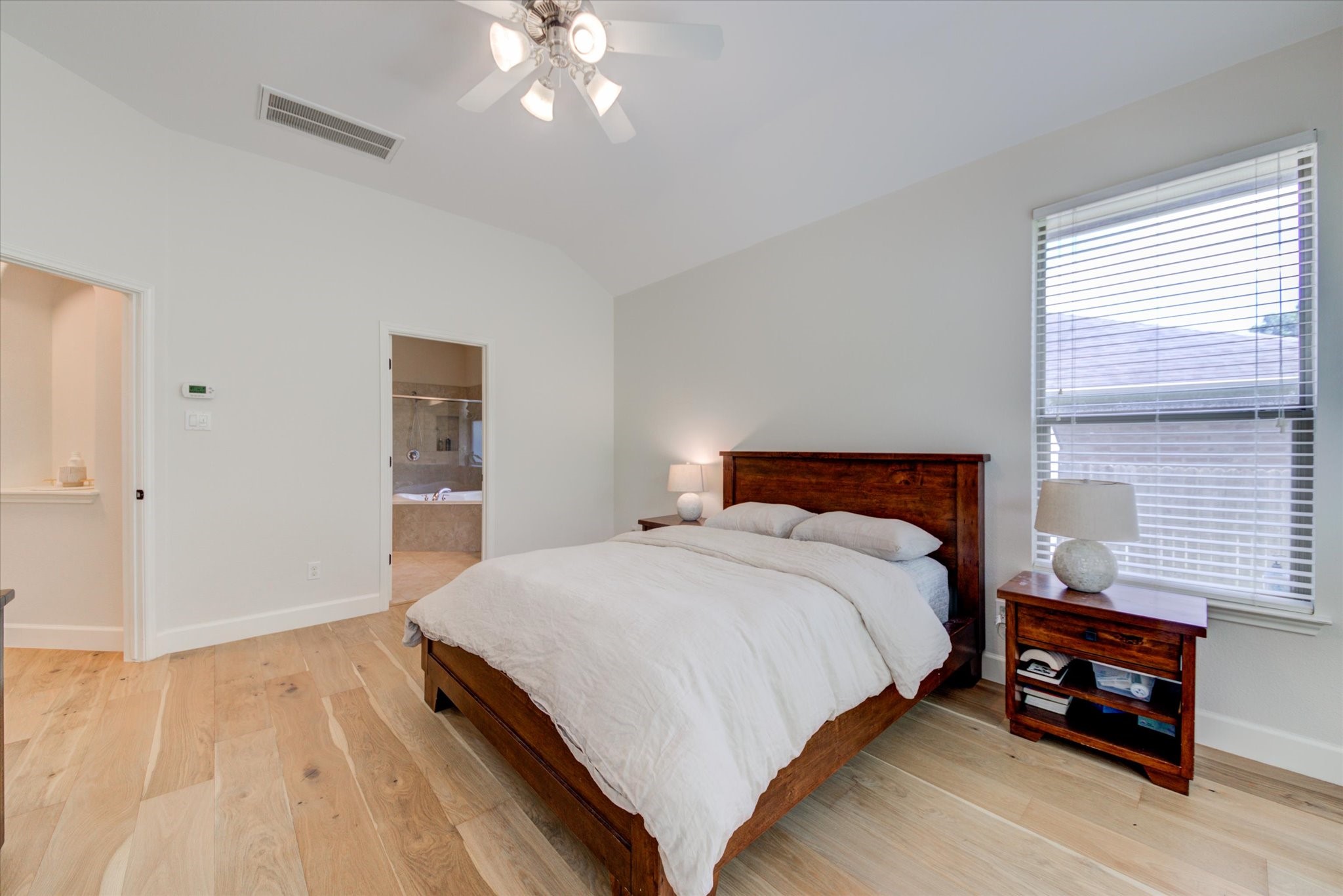 11129 Cap Stone Drive Austin, TX 78739 - Photo 15 of 33 Primary Bedroom on the main floor