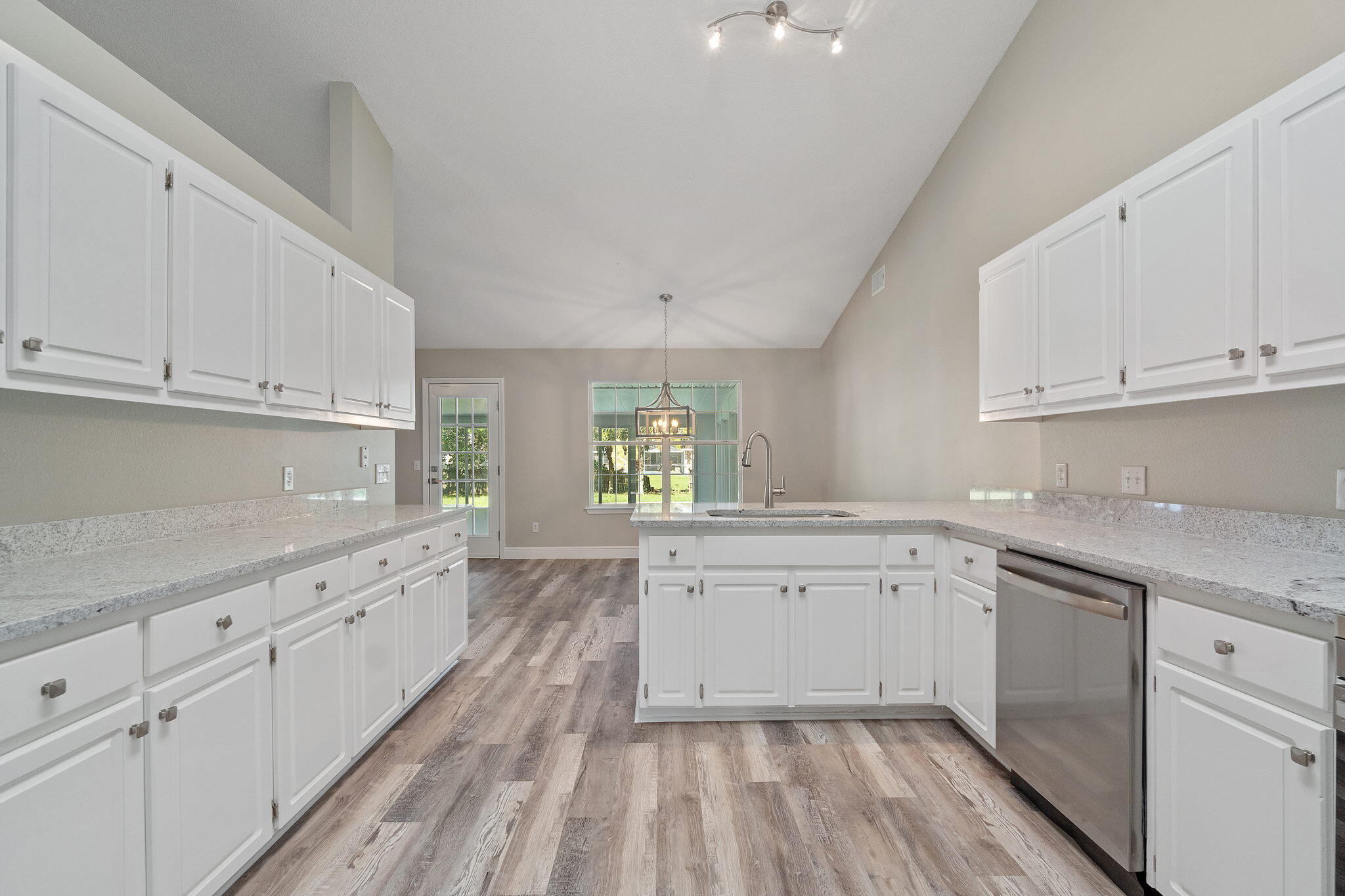 2005 Cardinal Lane Navarre, FL 32566 - Photo 21 of 63 a kitchen with sink cabinets and window