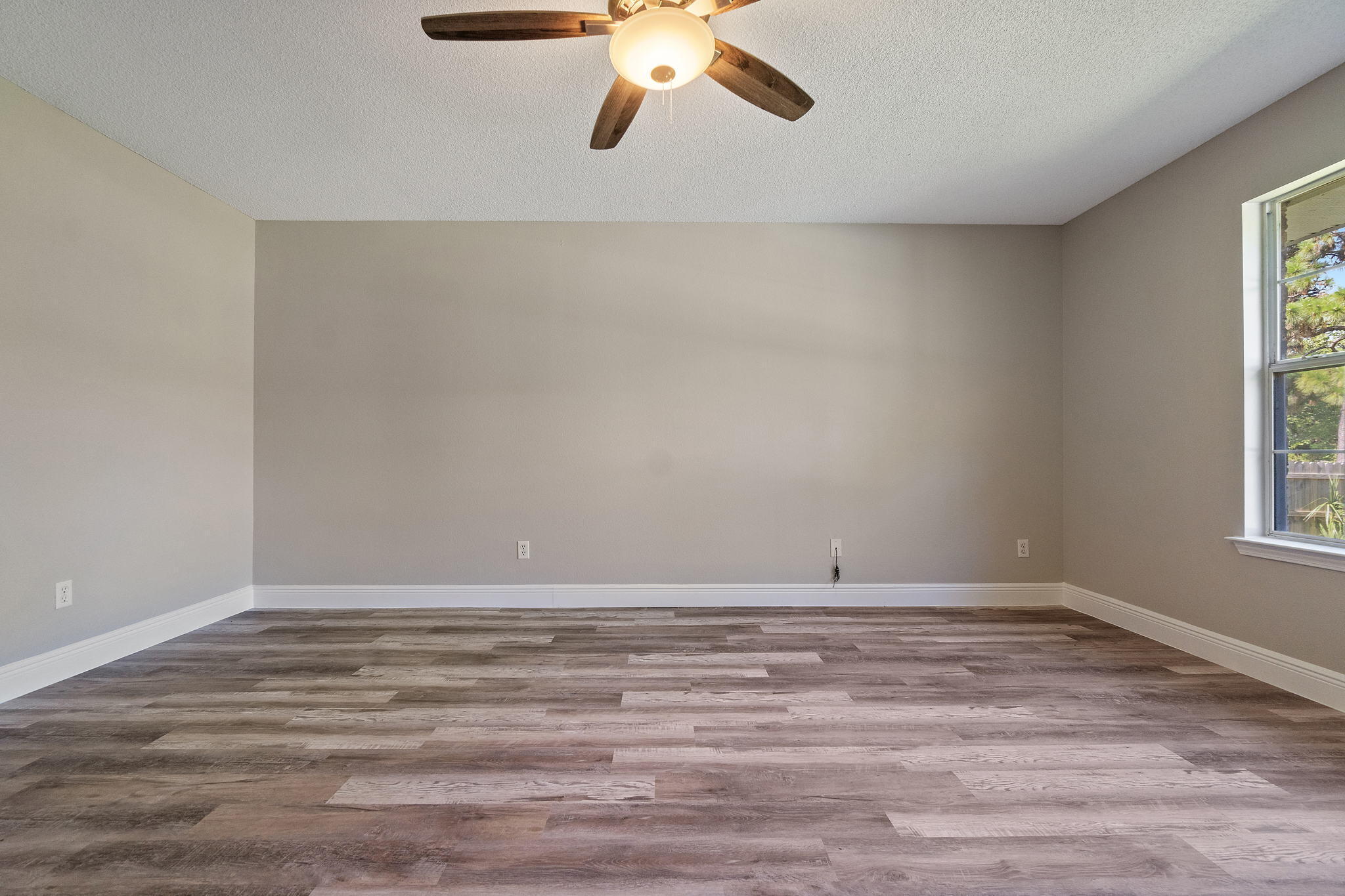 2005 Cardinal Lane Navarre, FL 32566 - Photo 26 of 63 a view of an empty room with a window
