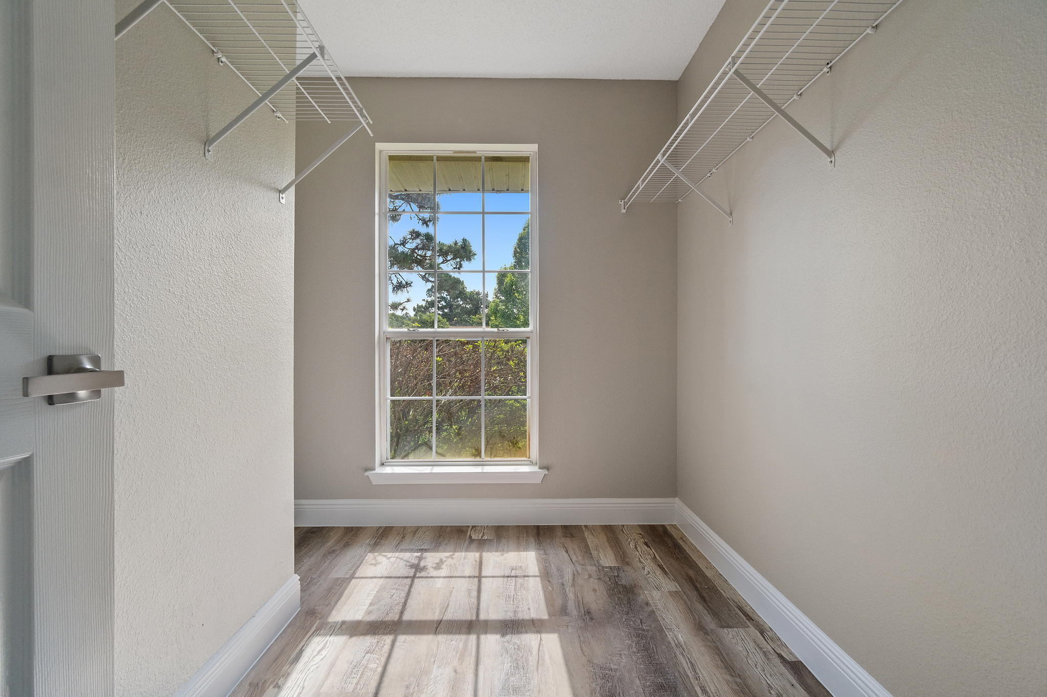 2005 Cardinal Lane Navarre, FL 32566 - Photo 30 of 63 a view of an empty room with a window