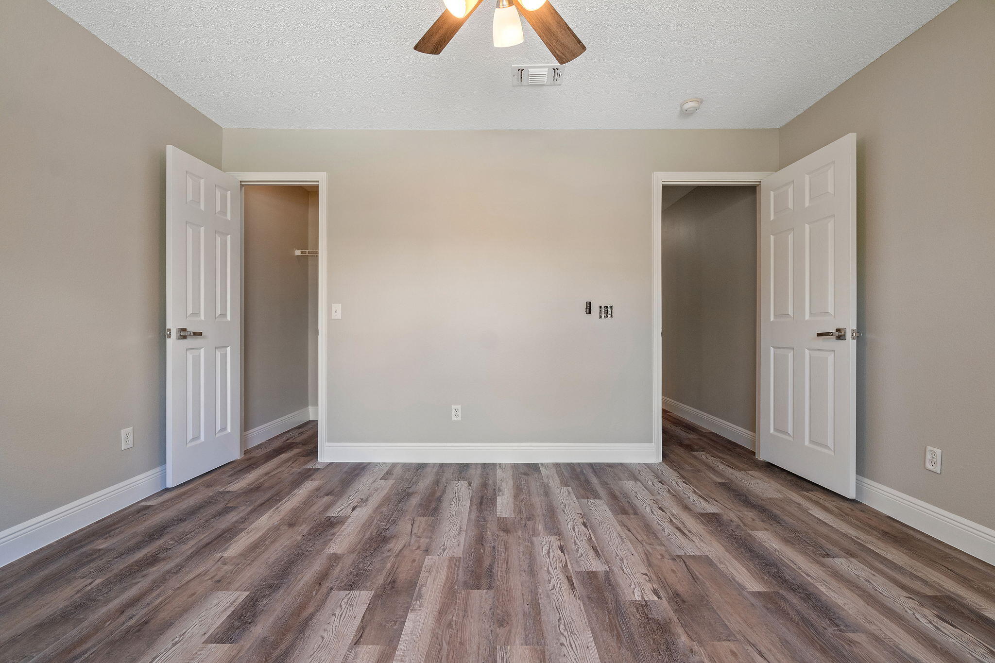 2005 Cardinal Lane Navarre, FL 32566 - Photo 39 of 63 wooden floor in an empty room with a window